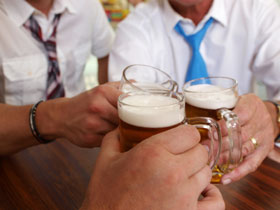 A group of friends celebrating the holidays with a drink. Contact Branson West Law for holiday DUI tips!